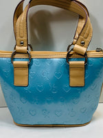 VINTAGE XOXO 100961 Hand Bag Purse Metallic Baby Blue Vinyl Logo Staining On Lining